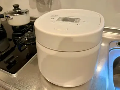a white mixer sitting on a counter next to a stove at GU Hotel Traditional Japanese-Style House in Tokyo15 Minutes by Train from Shinjuku Sleeps Up to 10 Guests in Tokyo