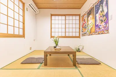 a room with a table on a rug at Nishiikebukuro 4people, 2mins to subway in Tokyo