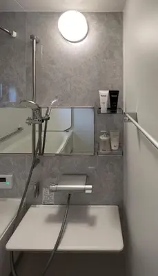 a small bathroom with a sink and a mirror at Shibuya house w Rooftop, 6min to Station, Skyline View in Tokyo