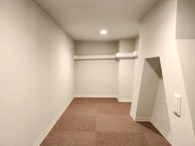 an empty room with a door and a wall at Ark Hills Haneda Inn in Tokyo