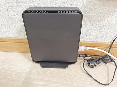 a laptop computer plugged into a wall with wires at Tokyo Stay West Sugamo #103 in Tokyo