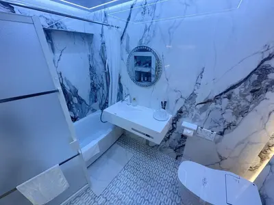 a white bathroom with a sink and a mirror at ReimiMondo 6702 in Tokyo