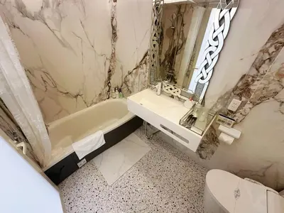 a bathroom with a sink and a tub and a mirror at ReimiMondo 6702 in Tokyo