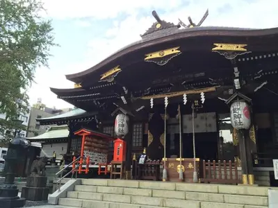 a pagoda with a building in a city at \u897f\u65b0\u5bbf\u548c\u5eb5 wa-an homestay in Tokyo