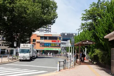 a truck is driving down a city street at Kotori Ikebukuro in Tokyo