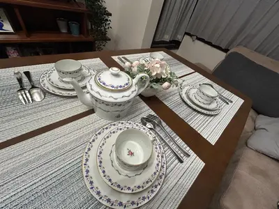 a table with plates and a teapot on it at Fuji Hotel Tokyo Takadanobaba2 in Tokyo
