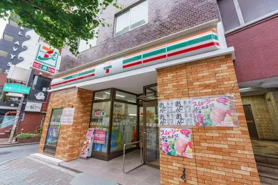 a store front of a brick building on a street at feel Shinjuku STAY in Tokyo