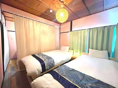 two beds in a small room with at Nakakasai Kodate NKK21 in Tokyo