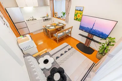 an overhead view of a living room with a television at Higashi koiwa 4 Bed rooms Villa 5 minutes walk from JR Koiwa station 60min friom Haneda airport in Tokyo
