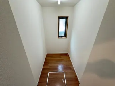a white room with a window and a wooden floor at Private stay, fully equipped 45 square meter, Easy access to Disneyland & Airports in Tokyo