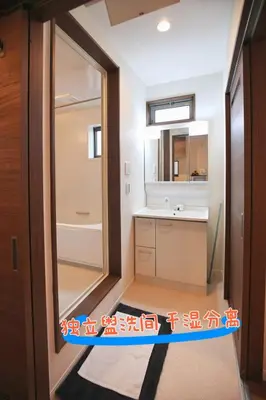 a bathroom with a sink and a mirror at SG5371 Visit Shibuya Crossing! Walking distance to a single family home for 8 people, private parking , downstairs supermarket food Shibuya in Tokyo