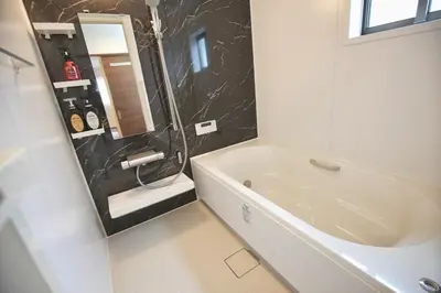 a bathroom with a bath tub and a sink at SG5371 Visit Shibuya Crossing! Walking distance to a single family home for 8 people, private parking , downstairs supermarket food Shibuya in Tokyo