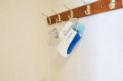 a bottle of toothbrush hanging on a wall at 101 Nishi Shinjuku Gochome Station 5 minutes on foot in Tokyo