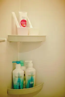 a shelf with bottles of milk and other items in a refrigerator at BRT201 Ikebukuro Station Double Apartment 201, Yamanote Line direct access to Shinjuku Shibuya, convenient transportation, fully furnished in Tokyo
