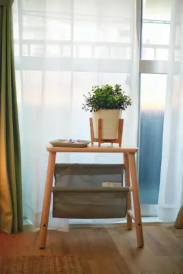 a table with a potted plant on it next to a window at BRT201 Ikebukuro Station Double Apartment 201, Yamanote Line direct access to Shinjuku Shibuya, convenient transportation, fully furnished in Tokyo
