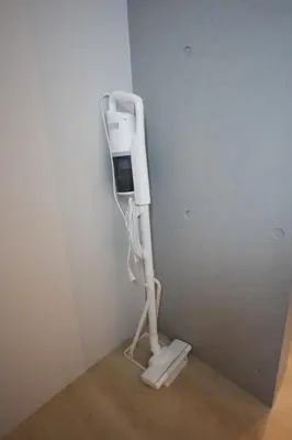 a room with a white hair dryer in a wall at Monzen-Nakacho Stylish 1LDK with 2 Double Beds in Tokyo