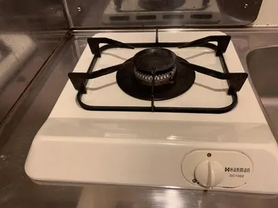 a stove top oven with a burner on top at 302 Nishi-Shinjuku-Gochome Station 5 minutes on foot in Tokyo