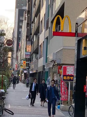 a group of people walking down a city street at Shibuya Star 101 4 mins to Shinjuku Free WiFi in Tokyo