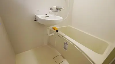 a bathroom with a sink and a bath tub at Shibuya Star 102-4 mins to Shinjuku-Free WiFi in Tokyo