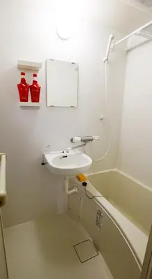a bathroom with a sink and a bath tub at Shibuya Star 102-4 mins to Shinjuku-Free WiFi in Tokyo