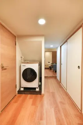 a living room with a tv in the middle of a room at BSY101 Ueno Shizuku 101, 3 minutes from the station, convenient location, play around Tokyo, walk to Ueno business district in Tokyo