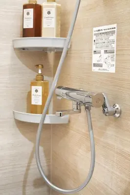 a shower hose hooked up to a sink in a bathroom at BSY302 Ueno Kozuki 302, walk to Ueno shopping district, 3 min walk to subway station, rare quality listing! High-speed 10G Wi-Fi in Tokyo