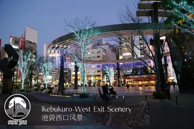a building with christmas lights in a city at night at M206 Easy access to Ikebukuro, Ginza, Shinjuku in Tokyo
