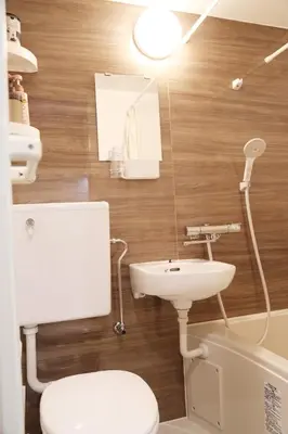 a bathroom with a toilet and a sink at M206 Easy access to Ikebukuro, Ginza, Shinjuku in Tokyo