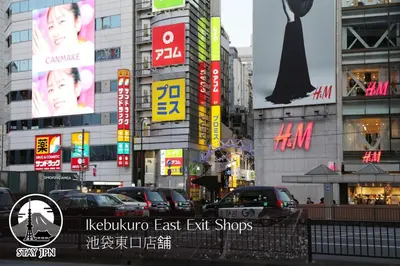 a city street with cars parked in front of buildings at M206 Easy access to Ikebukuro, Ginza, Shinjuku in Tokyo