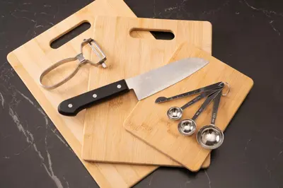 a cutting board with a pair of glasses and a knife at Skytree Tokyo Apartment Ohanachaya in Tokyo