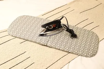a drone sitting on top of a pillow on a bed at C's Tiny House , 2 double beds , smart stay , near Tokyo Skytree in Tokyo