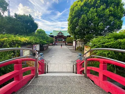 a red bridge over a walkway with a building at C's Tiny House , 2 double beds , smart stay , near Tokyo Skytree in Tokyo