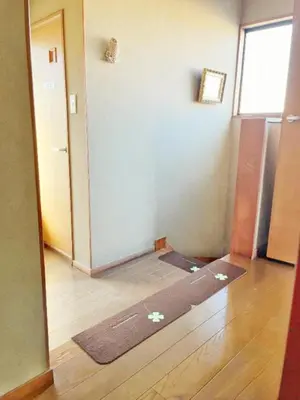 a room with a door and a rug on the floor at Japan Harry Potter Guesthouse in Tokyo