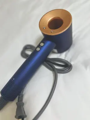 a blue flashlight with a cord plugged into it at 4min to \u6771\u65b0\u5bbfShinjuku in Tokyo