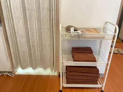 a towel rack in a room with towels at Shibuya myroom in Tokyo