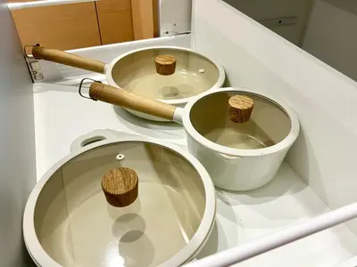 a bathroom with a toilet with two wooden stools on it at Shinjuku Area 3 Bedroom House in Tokyo