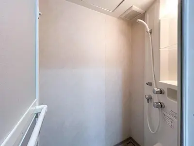 a shower stall in a bathroom with a toilet at mt \u4e2d\u91ce\u30d3\u30eb in Tokyo