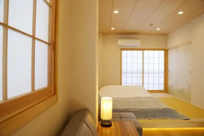 a small room with a bed and a window at M208 Easy access to Ikebukuro Red Leaves ,Golden Ginkgo in Tokyo