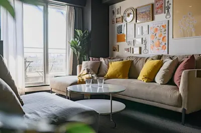 a living room with a couch and a table at \u30a8\u30d3\u30b9\u30d3\u30eb8\u968eStayCreek in Tokyo