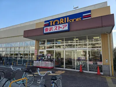 a store front with bikes parked outside of it at Tokyo Nukumori Lodge in Tokyo