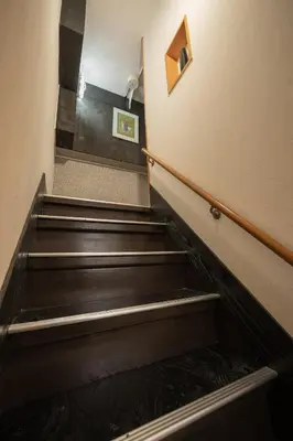 an empty staircase in a building with an escalator at Ryokan ○ - Vacation STAY 01019v in Tokyo