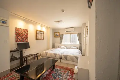 a small bedroom with a bed and a television at Ryokan ○ - Vacation STAY 01019v in Tokyo