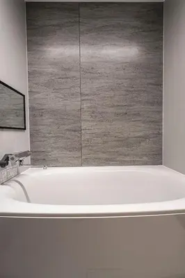 a bathroom with a bath tub with a large window at Cava House - Vacation STAY 07286v in Tokyo