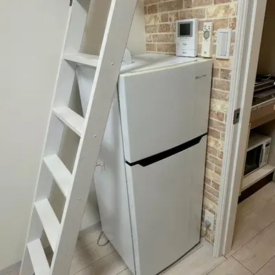 a white refrigerator in a kitchen with a ladder at D Regalo - Vacation STAY 10830v in Tokyo