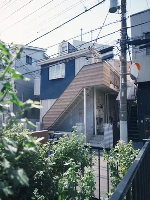 a blue house with a fence in front of it at D Regalo - Vacation STAY 10830v in Tokyo