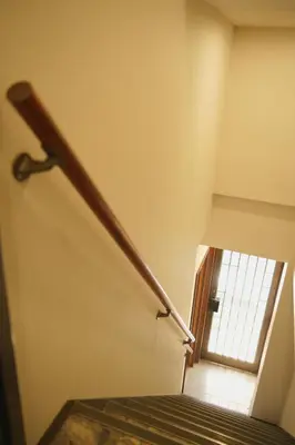 a stairway with a window and a stair railing at Takaoka Building - Vacation STAY 10286v in Tokyo