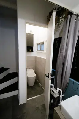 a bathroom with a toilet and a sink at Eden House - Vacation STAY 19890 in Tokyo