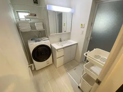 a bathroom with a washing machine and a sink at Nerima-ku - House - Vacation STAY 19929 in Tokyo