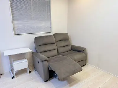 a reclining chair in a room with a table at Nerima-ku - House - Vacation STAY 19929 in Tokyo