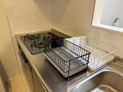 a kitchen counter with a stove and a sink at Nerima-ku - House - Vacation STAY 19929 in Tokyo